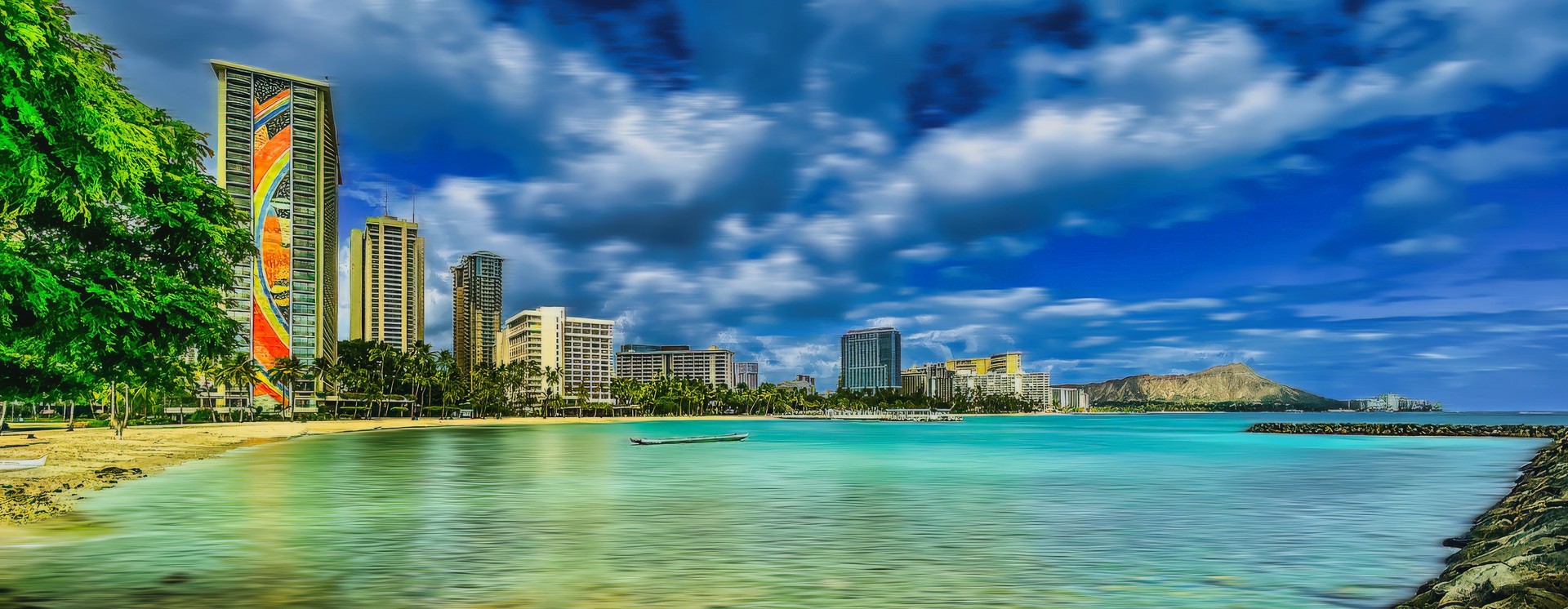 Panoramic cityscape view of buildings with Waikiki beach